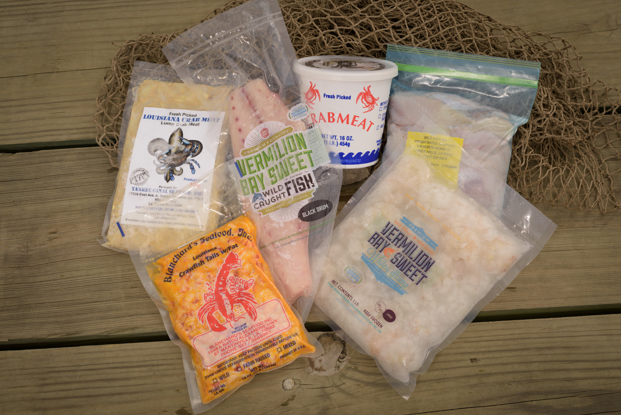variety of packaged seafood products on dock